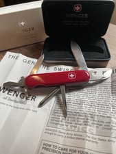 Navaja suiza Highlander dentada Wenger de colección logotipo objetivo caja estuche papeles