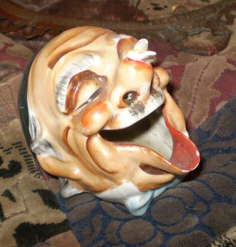 Vintage novelty hobo head with bee on nose ashtray . smoke comes out nose