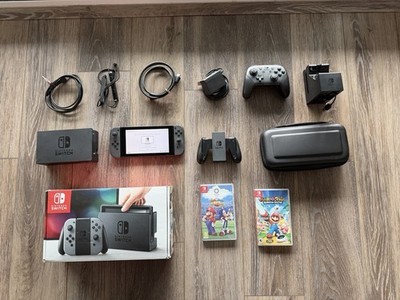 Nintendo Switch V2 Bundle - Pro Controller, 2 Games, & Charging Dock