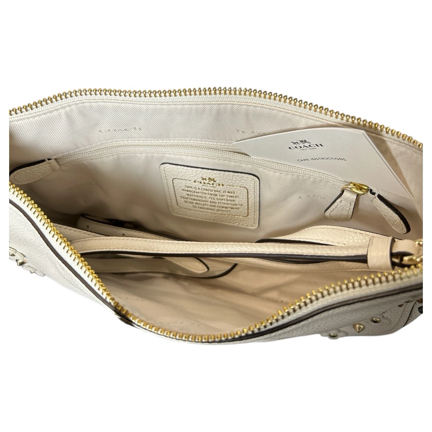 Borsa piccola Coach Chelsea nuova con etichette borchie rivetti floreali pelle li gesso