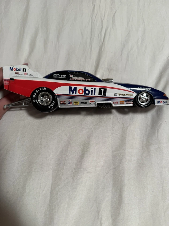 Coche divertido de juguete Whit Bazemore Mobil 1995 1:24 con caja Foto 3 de 4