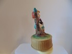 Vintage Taiwan Girl Sitting On Log Figurine Rotating Music Box — photo 4
