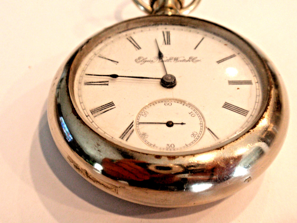 A massive 18-size Elgin pocket watch in a 57.5mm case — professionally serviced and running, the kind of heirloom piece that stops conversations.