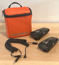 Set of 2 Pocket Wizard Plus IV transceivers w/sync cords and soft case