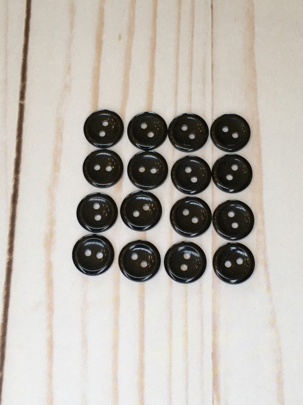 black buttons with slight raised edge/ curved center, flat back- 1/2”- set of 16