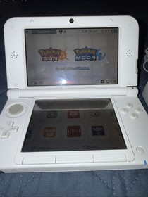Nintendo 3DS XL Pink And White Handheld W/ Charger Pokemon Virtual Console Games