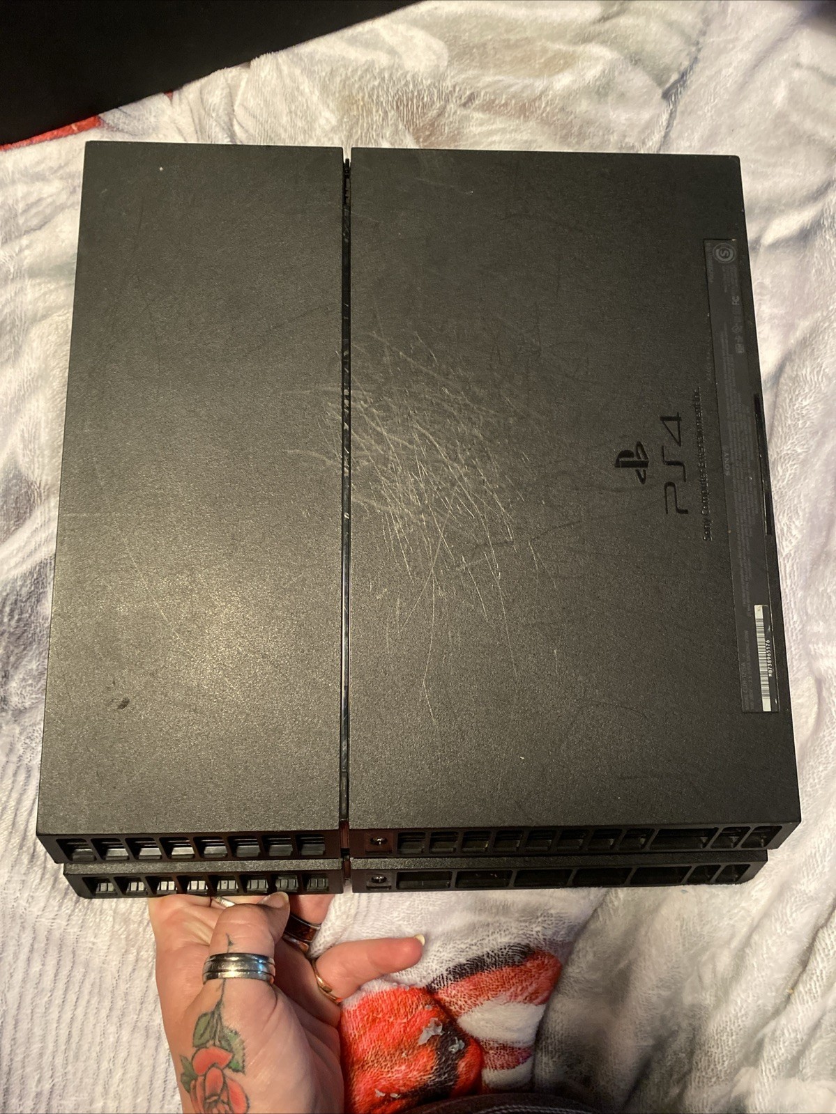 PS4 Slim & PS4. 2 Controllers ( 1 Wireless),2 HDMI CORDS, 2 Power Cords, 3 Games