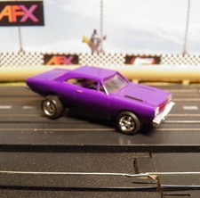 Dash Motorsports used Purple Plymouth Road Runner body on Aurora T-jet chassis