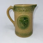 A E Hull Salt-Glazed Stoneware “Grazing Cows” Pitcher - Yellow Ware w/ Green