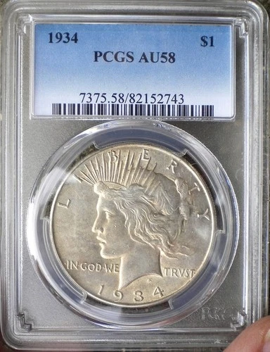 1934 PEACE SILVER DOLLAR PCGS AU-58