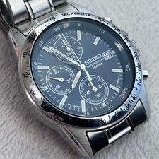 Seiko 7T92-0DW0 Quartz Chronograph Watch Silver 100M Water Resistant Used