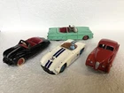 4 Dinky cars - 1950s. 140a Atlantic, 131 Cunningham, 132 Packard, 157 Jaguar XK