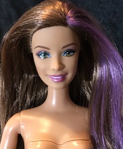 barbie doll with purple hair