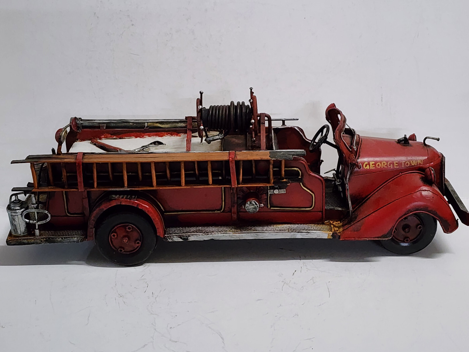 UNBRANDED TIN FIE ENGINE LHD 47CM LONG GEORGETOWN IT IS A BIT BROKEN ...