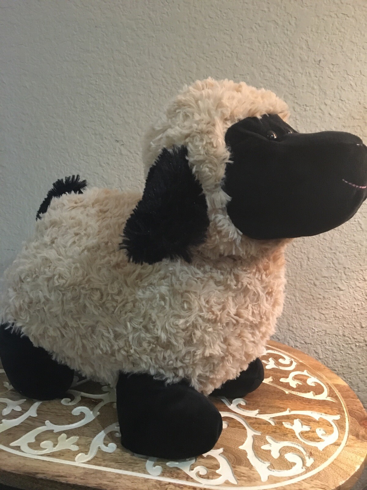 large stuffed sheep