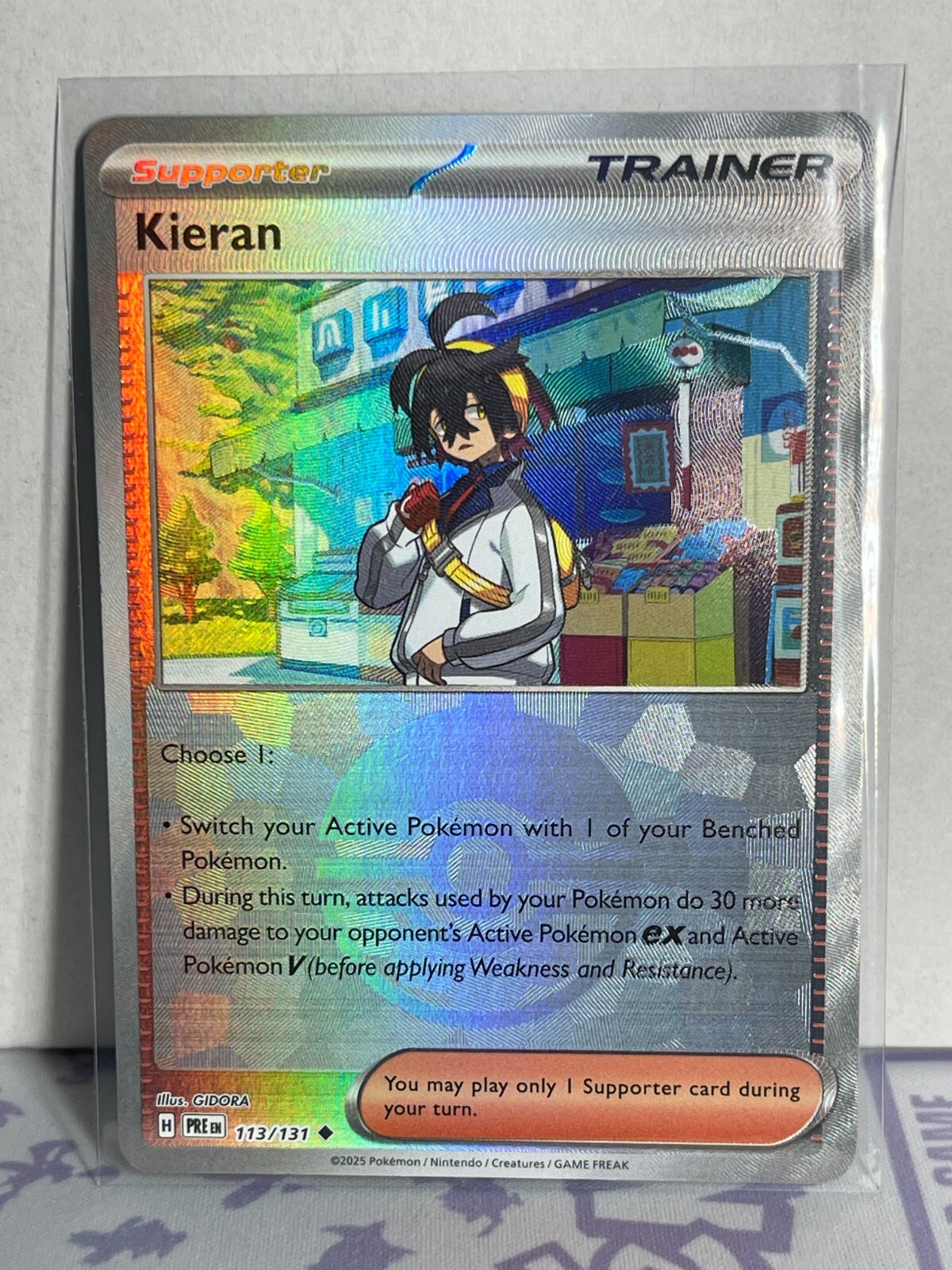 Kieran - (Poke Ball Pattern) 113/131 Prismatic Evolutions Holo