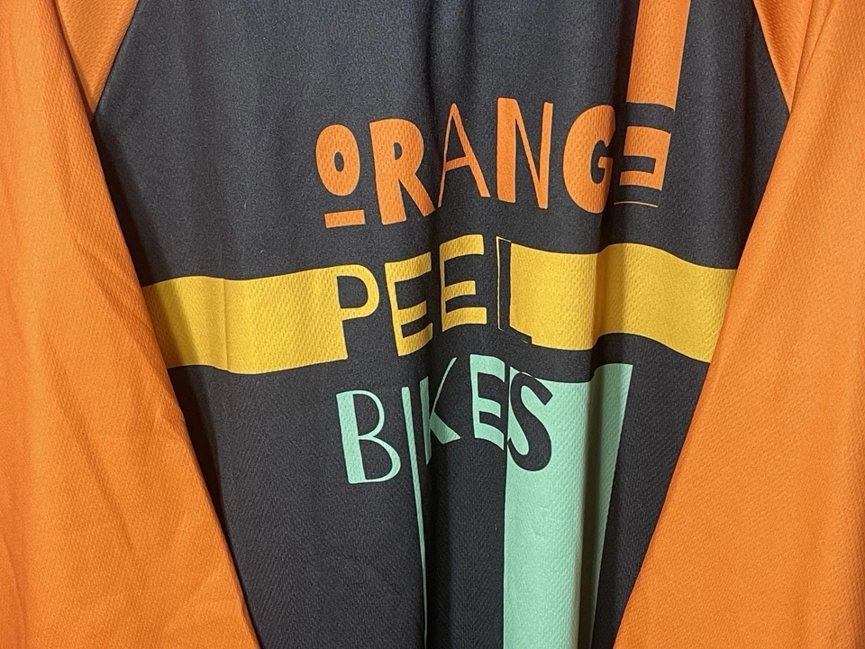Camiseta deportiva de ciclismo Curve para hombre XL 26 Pit to Pit naranja peel bicicletas poli manga larga D1 Foto 2 de 4