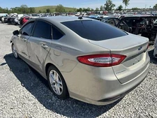 Used Left Tail Light Assembly fits: 2015 Ford Fusion lid mounted Hybrid SE L. Le