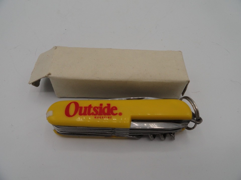 An original Outside Magazine branded multi-tool knife still in its box — a quirky, conversation-starting piece of '90s outdoor-media merch that doubles as a functional EDC.