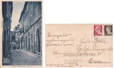 CARASSAI: Via Roma  (viso di Mussolini su edificio)  1938