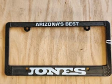 Preowned Auto License Plate Frame "Arizona's Best JONES"