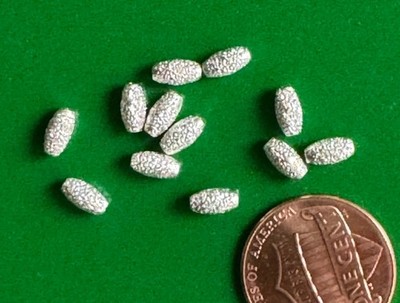 Sterling silver rice shaped spacer beads, stardust, 3mm by 6 mm, 24 units