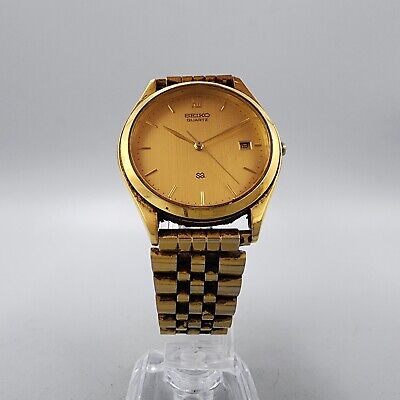 Seiko SQ Watch Men 35mm Gold Dial Gold Tone Date Round 5Y22 Seiko SQ Watch Men 35mm Gold Dial Gold Tone Date Round 5Y22