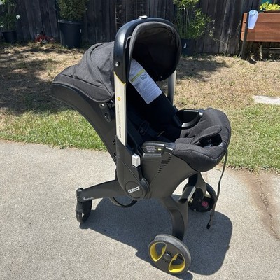 Doona Black Single Folding Infant Stroller Transforming