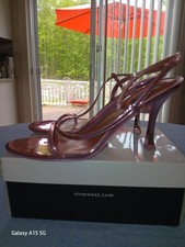 Nine West Isaw Dress Sandals in a metallic pink color