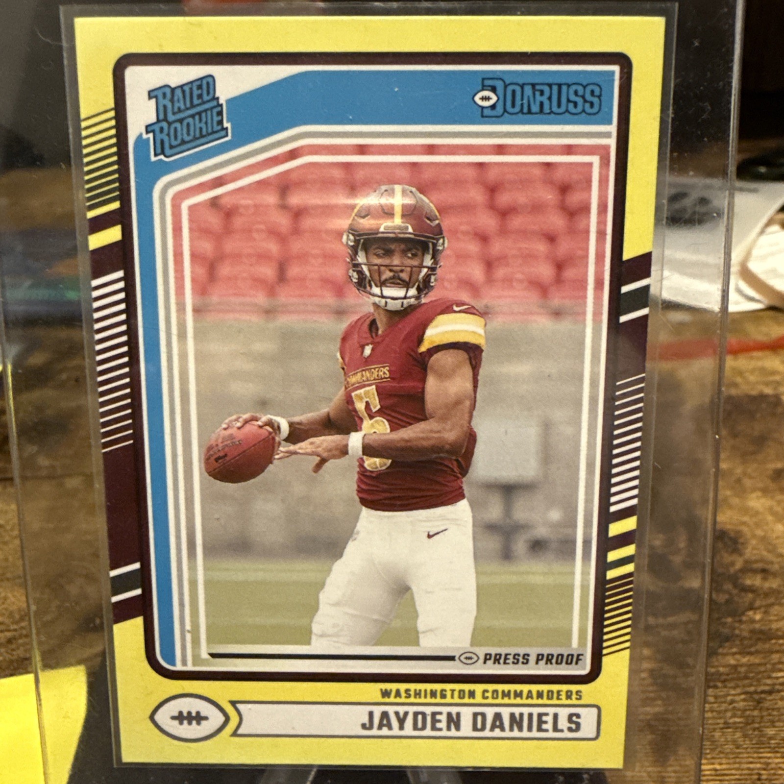 2024 Panini Donruss - Rated Rookie Jayden Daniels #389 Press Proof Yellow (RC)