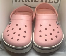 Crocks Unisex. Good condition Women 7 or mens 4.Pink amd white,with little blue