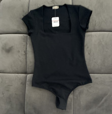 Free People Women s Black Solid Short Sleeve One Piece Bodysuit Size S Regular