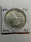 1882-O/S String Morgan Silver Dollar AU+ Tough Variety