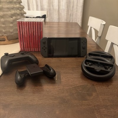 Nintendo Switch with Dock, Joy-Con, Pro Controller, 11 Games And More