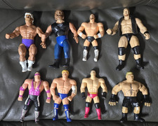 LOT of 8 Vintage WWE WWF Action Figures Stone Cold Lesner Flair Sycho Sid