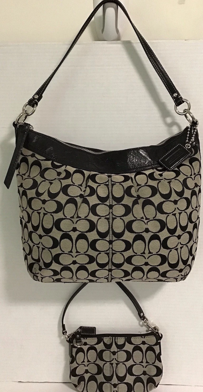 Borsa a tracolla Coach nera tela bordo pelle con polso omaggio usata in ottime condizioni