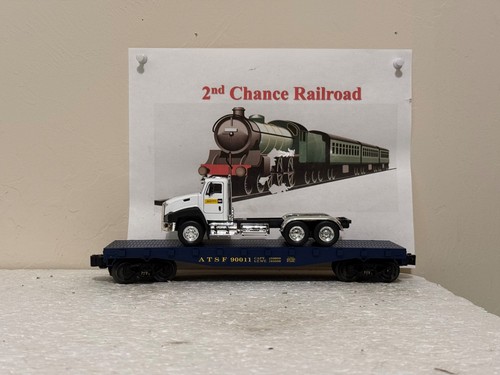 Trenes escala O Lionel Santa Fe vagón plano 90011 con tractor Bob Tail OTR | Condition: New