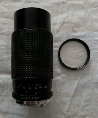 TOKINA Teleobjektiv 80 - 200 mm 1:4 OM-Systems mit UV Filter TAYON 55 mm