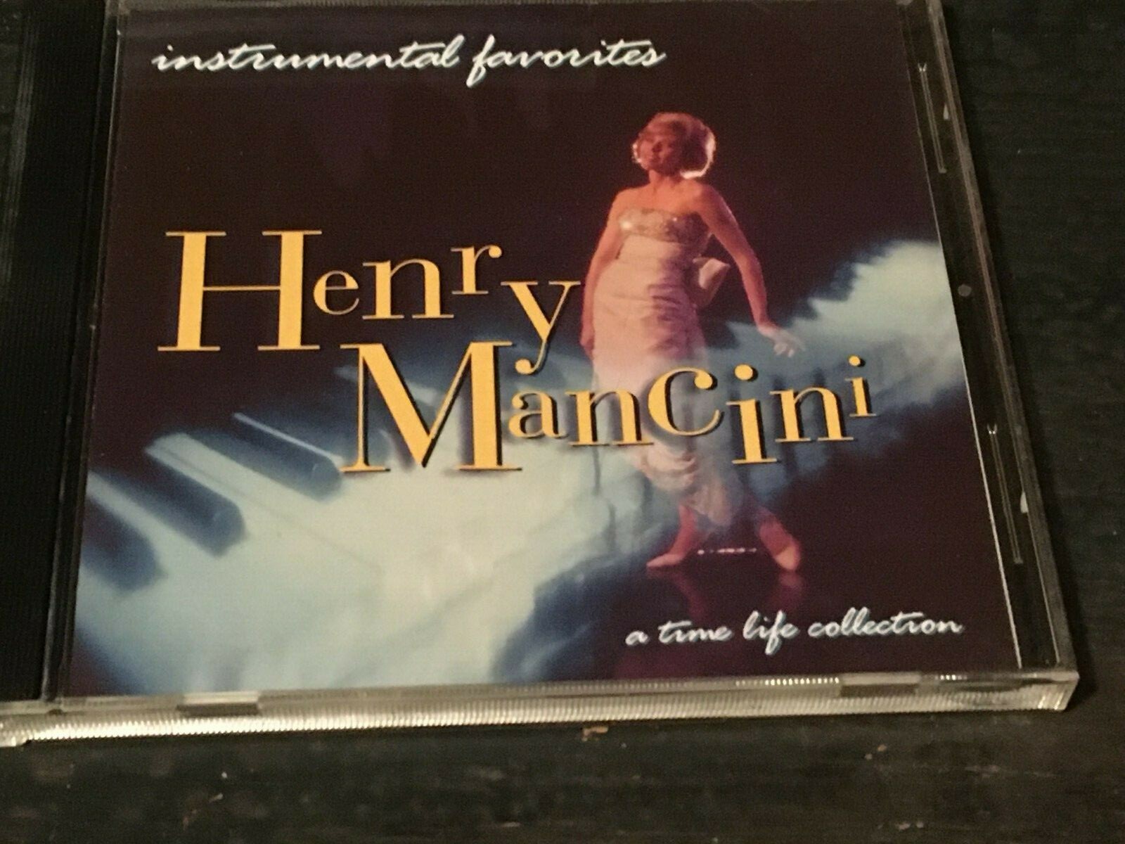 Experience the Timeless Elegance of Henry Mancini's Instrumental Favorites CD by Time Life