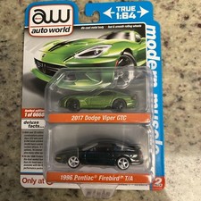 AUTO WORLD.. MODERN MUSCLE.. DELUXE SERIES.. TARGET EXCLUSIVE.. 2 PACK.. 1:64