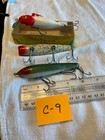 Three fishing lures, Heddon Zaragossa, Shakespeare Marty’ Silver streak, King C