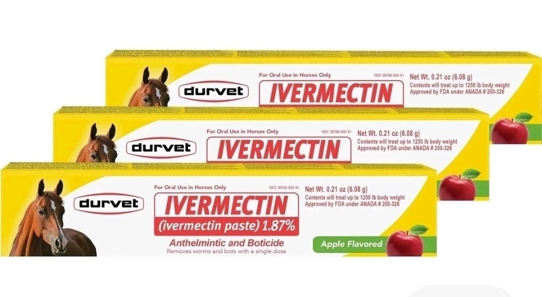 Three yellow Durvet horse dewormer paste boxes with red apple logo and text, featuring black text and red apple graphics.