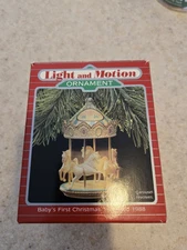 USED - 1988 Hallmark Baby's First Christmas Carousel Light and Motion Ornament
