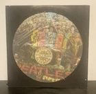 Unbranded- Beatles Sgt Pepper 12” picture disc LP record -VF/EX