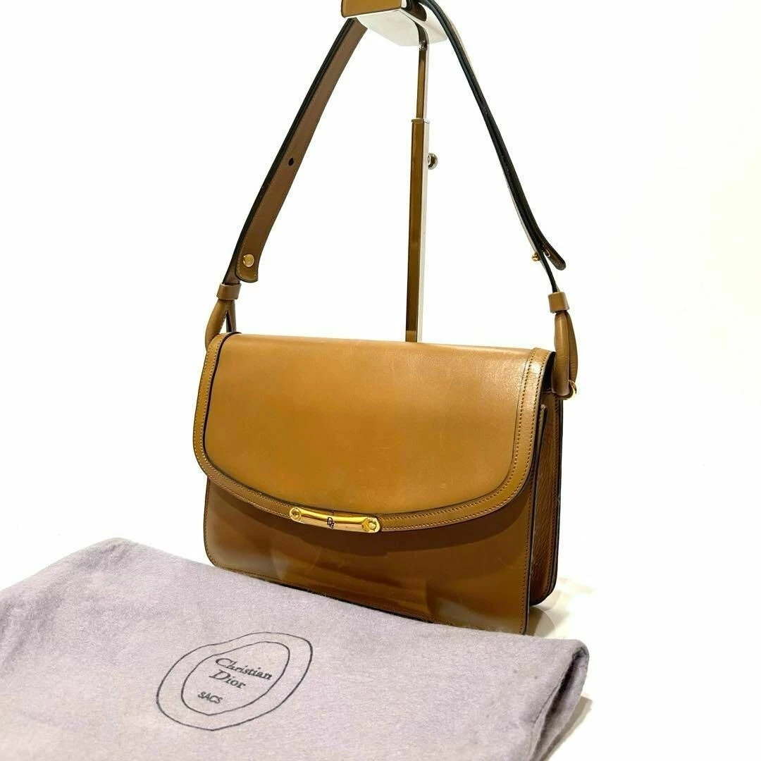 Sac à main bandoulière vintage Christian Dior cuir marron or quincaillerie 202502R