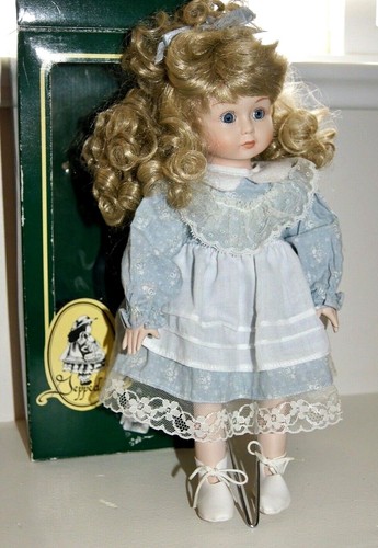 Geppeddo porcelain 12" vintage doll. Blonde curly hair blue eyes. - Picture 6 of 7