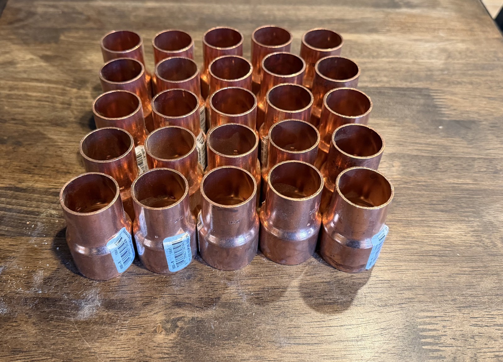 Lot of 25 1-1/4 in. x 1 in. Copper Pressure Cup x Cup Reducing Coupling W/Dimple
