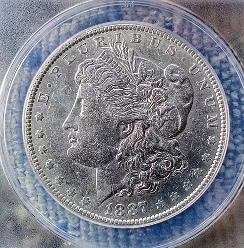 1887 P  Morgan Silver Dollar ANACS Graded AU 55 Condition.