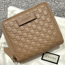 Gucci Beige GG Logo Zip-Around Folding Wallet...