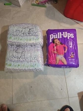 Luvs 72 pack size 4 and Huggies Pull ups size 4-5 33 pack 105 Total Diapers